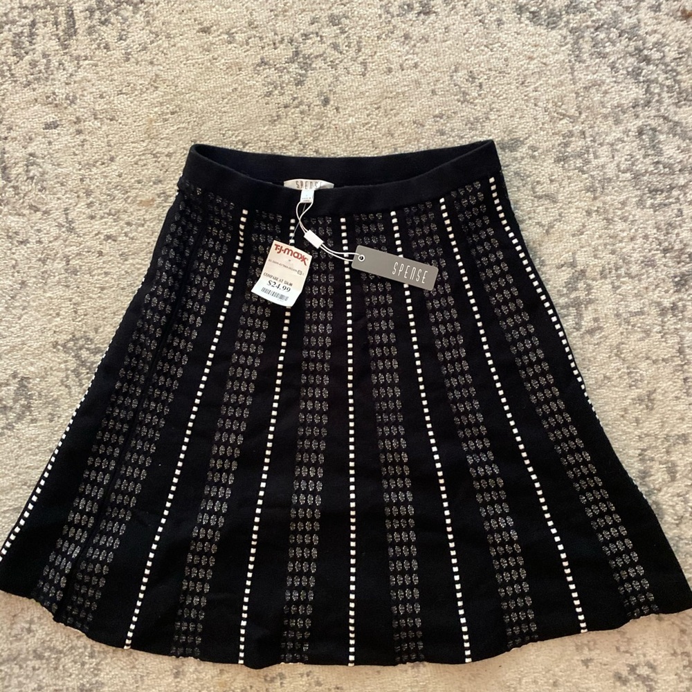 Cute skirt — very flattering and never worn!